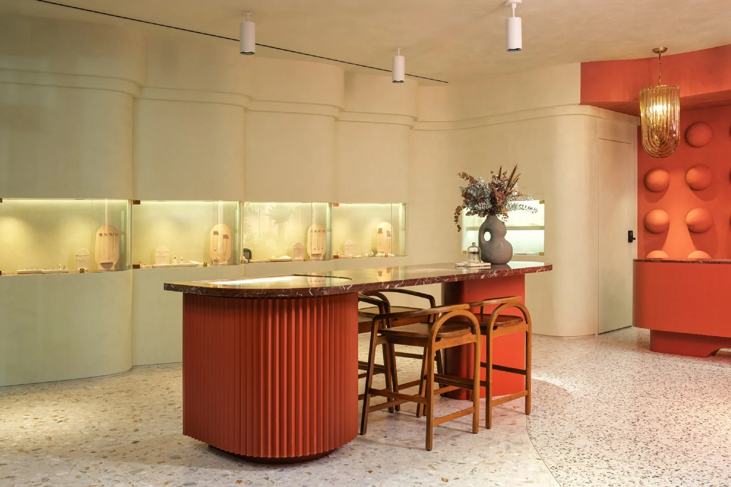 Lit jewelry display cases with MICRO 5 ATOM-OPTICS in a retail showroom