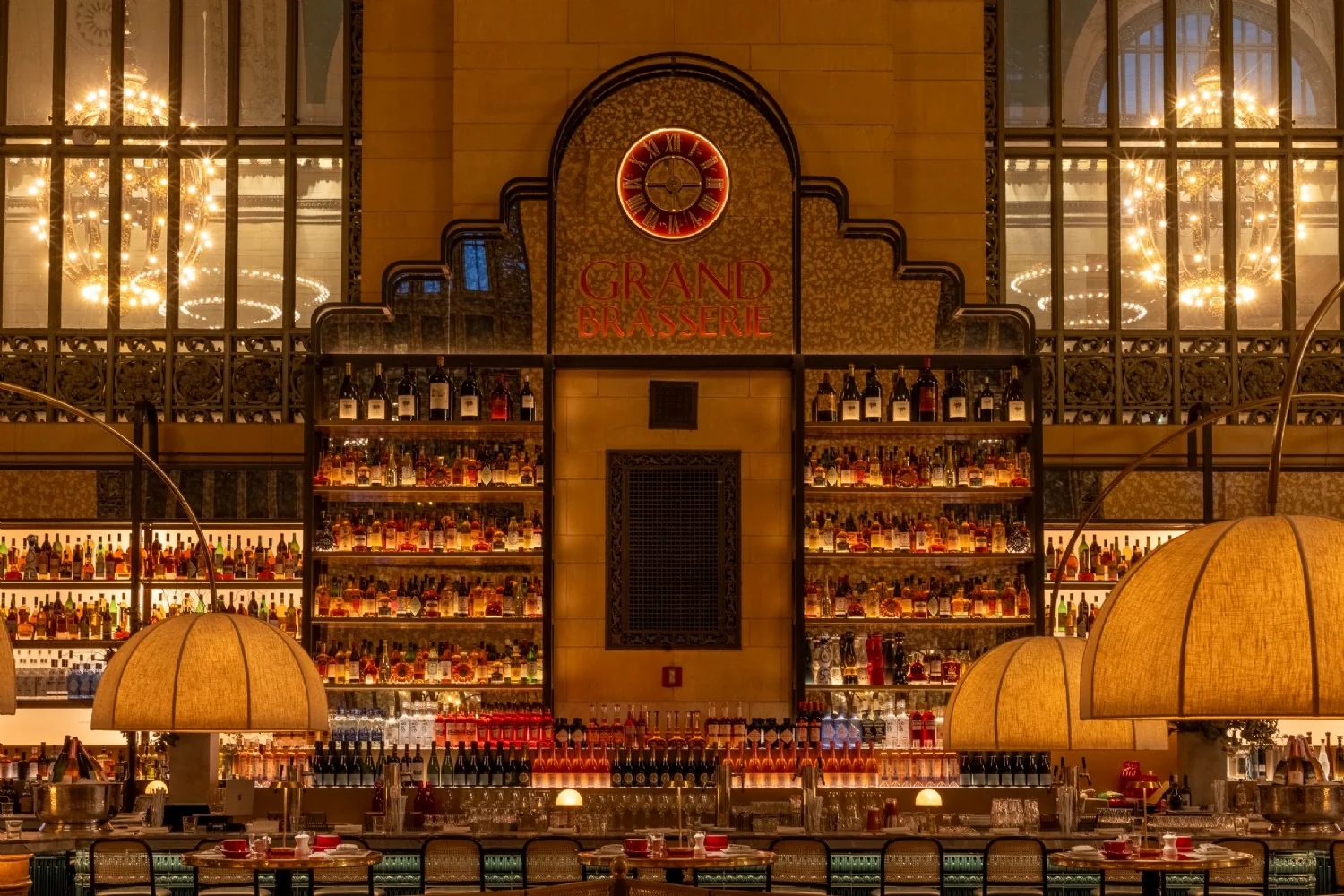 Vertical MICRO 5 ATOM fixtures in the back-bar shelving at Grand Brasserie