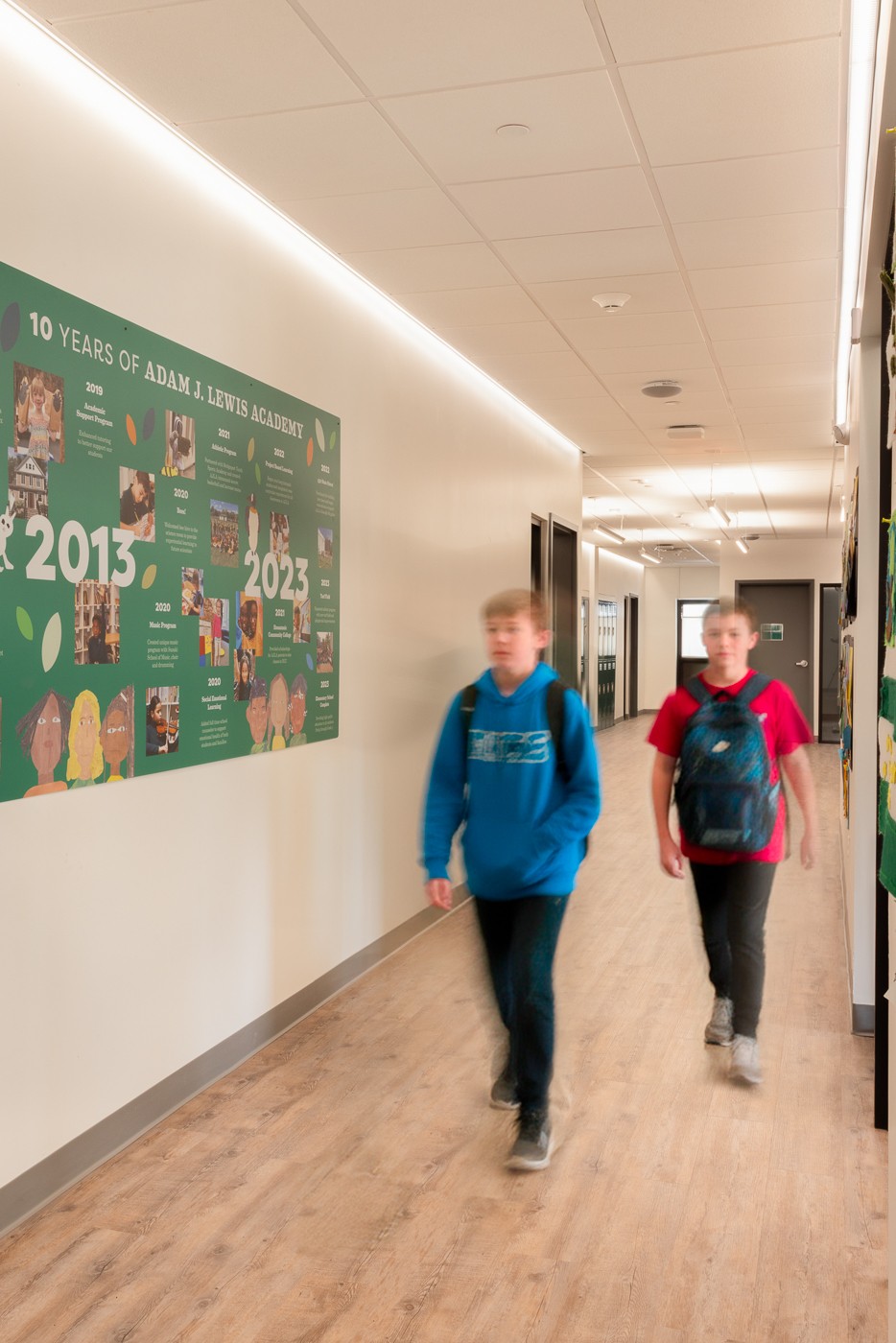 In hallways, PERI does double duty from each side, showcasing the school&rsquo;s wall displays.