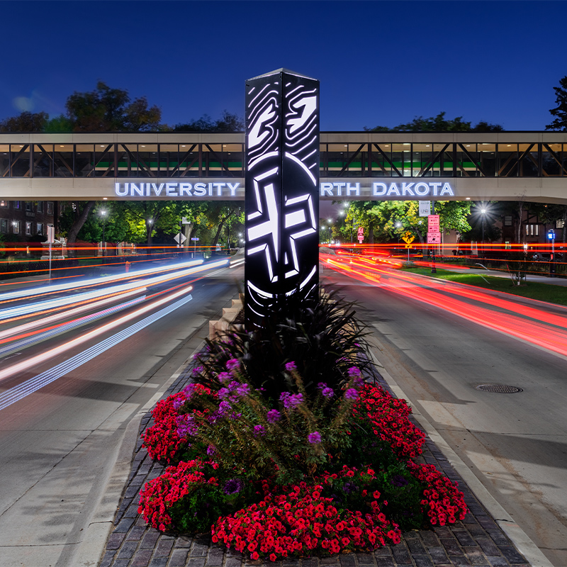 Roadway island illuminates the roadway into University of North Dakota 