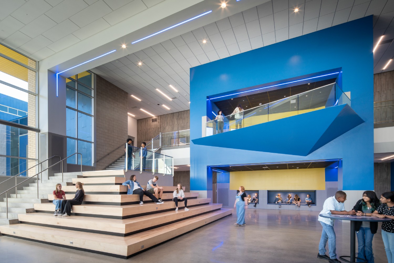Union Middle School school cafeteria lighting by QTL featuring high-efficacy linear LED fixtures and architectural design