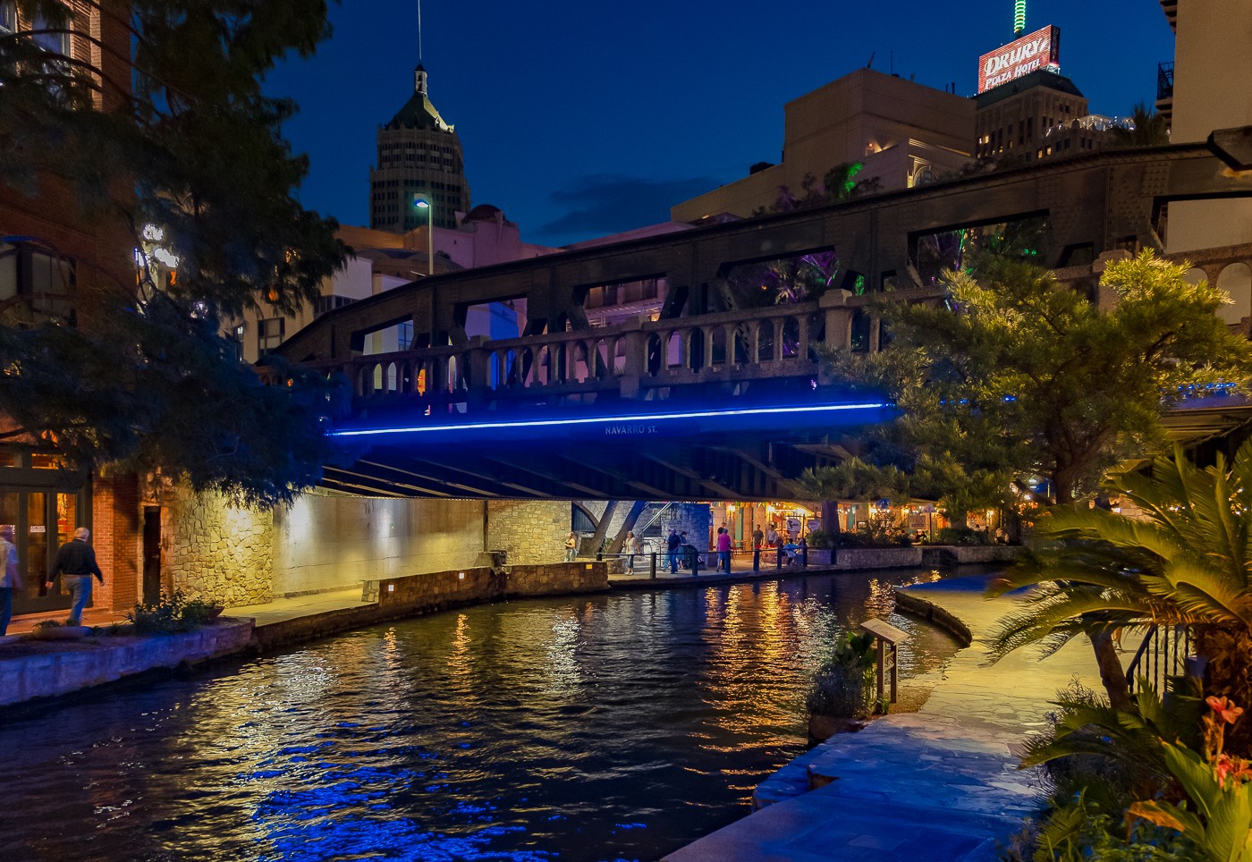 San Antonio River Walk pedestrian walkway lighting by QTL enhancing safety and ambience along riverside path