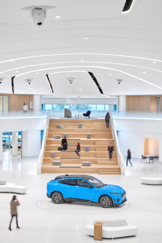 Vibrant lighting design in the Ford Experience Center's main lobby by Illuminart