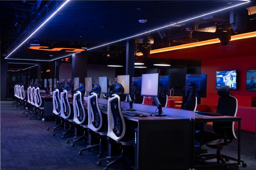 Gaming lights and esports lighting layout showcasing workstation rows and ceiling detail at Syracuse University.